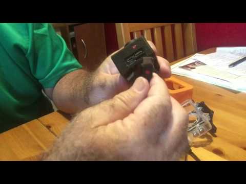 Action Sports Camera Charging and Inserting the Charger