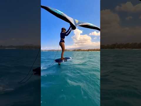 Wing girl flying over water with a foil! 😍😱 @jdfollowcam7256