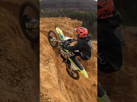 Dirt Bikes Jump a Ledge